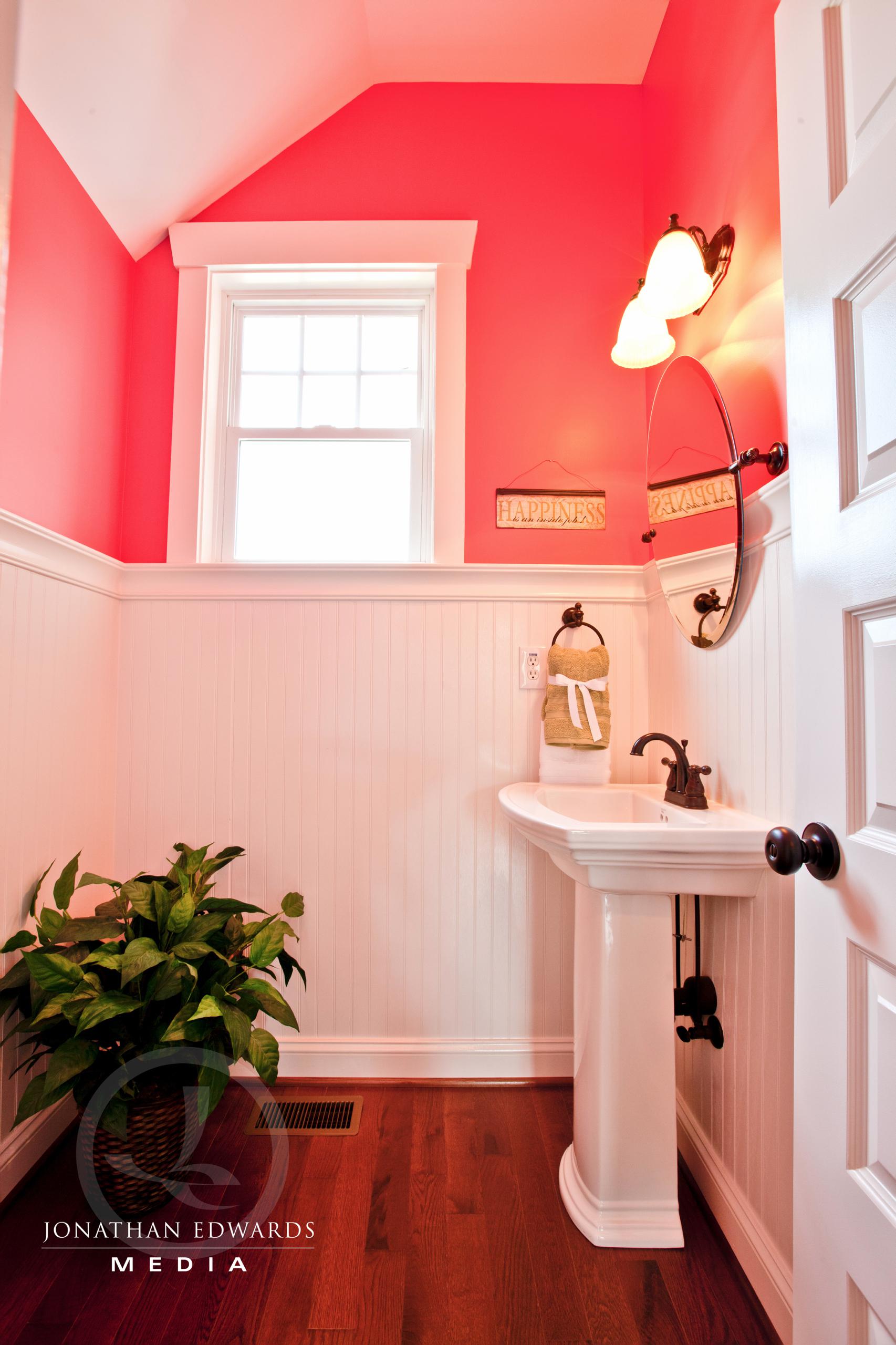 Elegant bathroom with red walls  | Bathroom Gallery | Stephen Alexander Homes | Chesapeake, VA