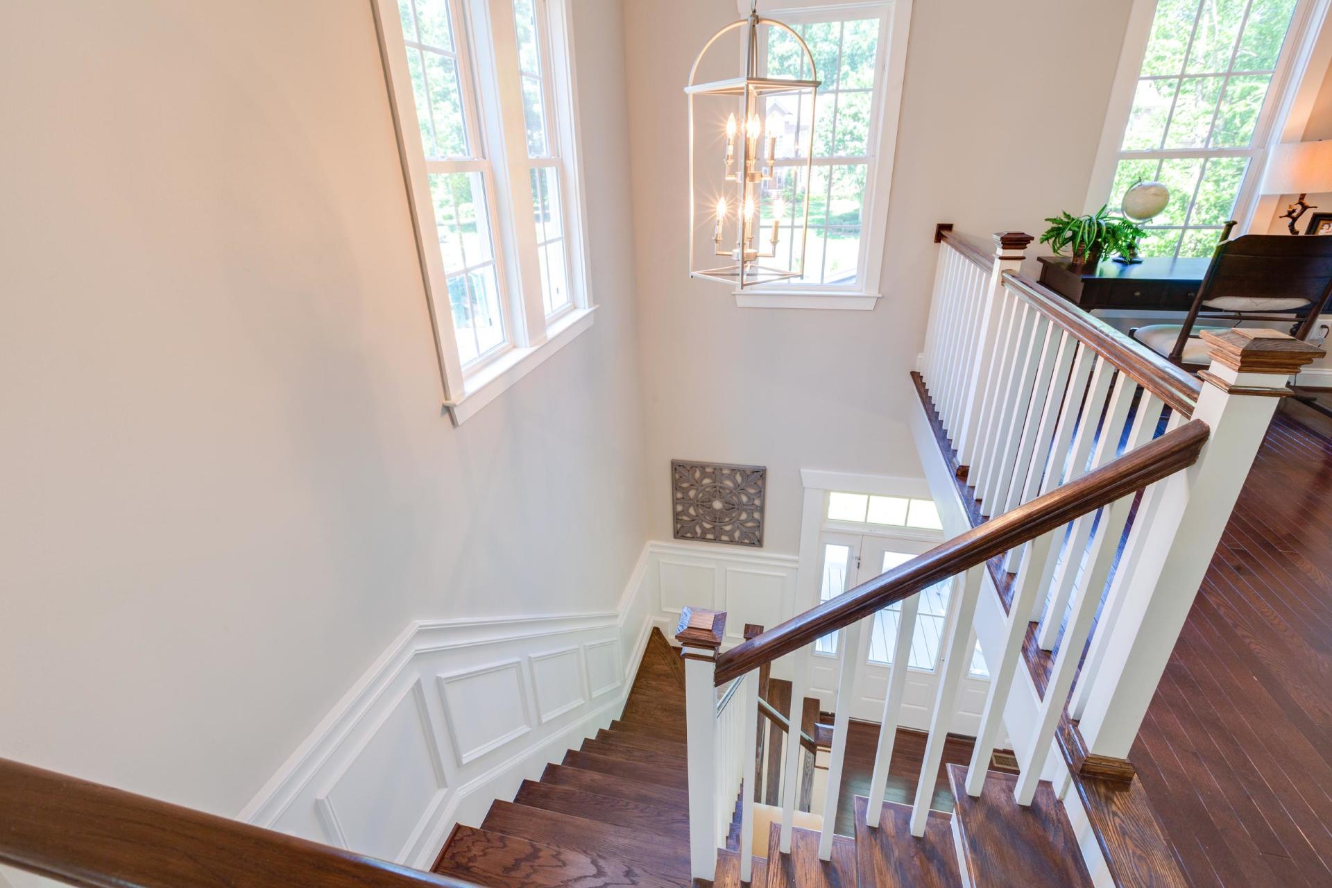 Elegant view of stairway from second floor  | Living Spaces Gallery | Stephen Alexander Homes | Chesapeake, VA