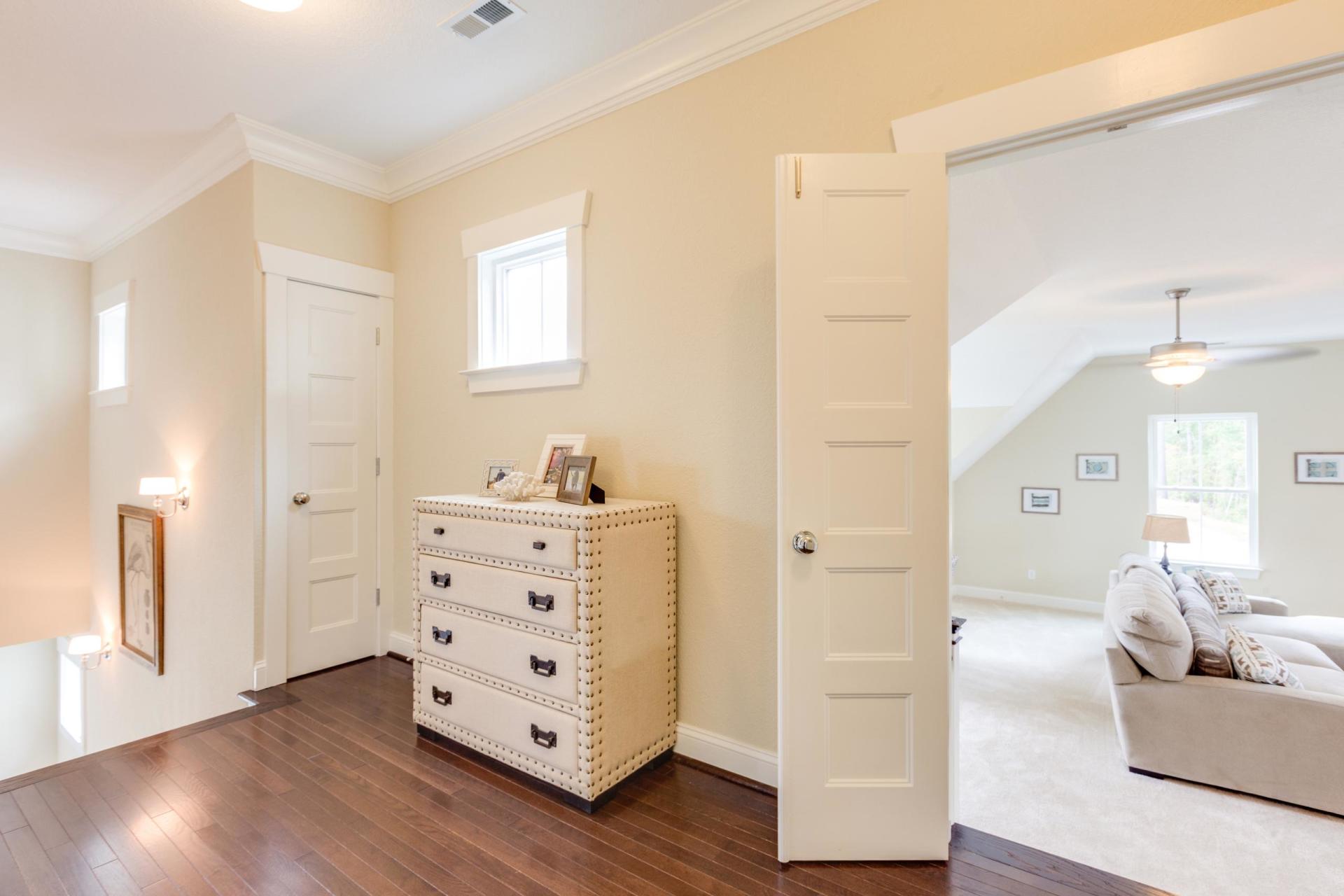 Hallway view of elegant living area  | Living Spaces Gallery | Stephen Alexander Homes | Chesapeake, VA