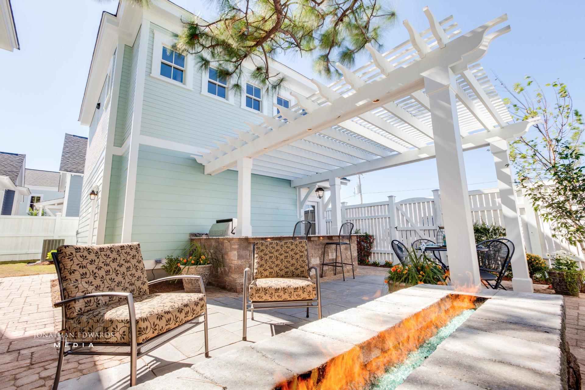 Elegant covered exterior seating area  | Living Spaces Gallery | Stephen Alexander Homes | Chesapeake, VA