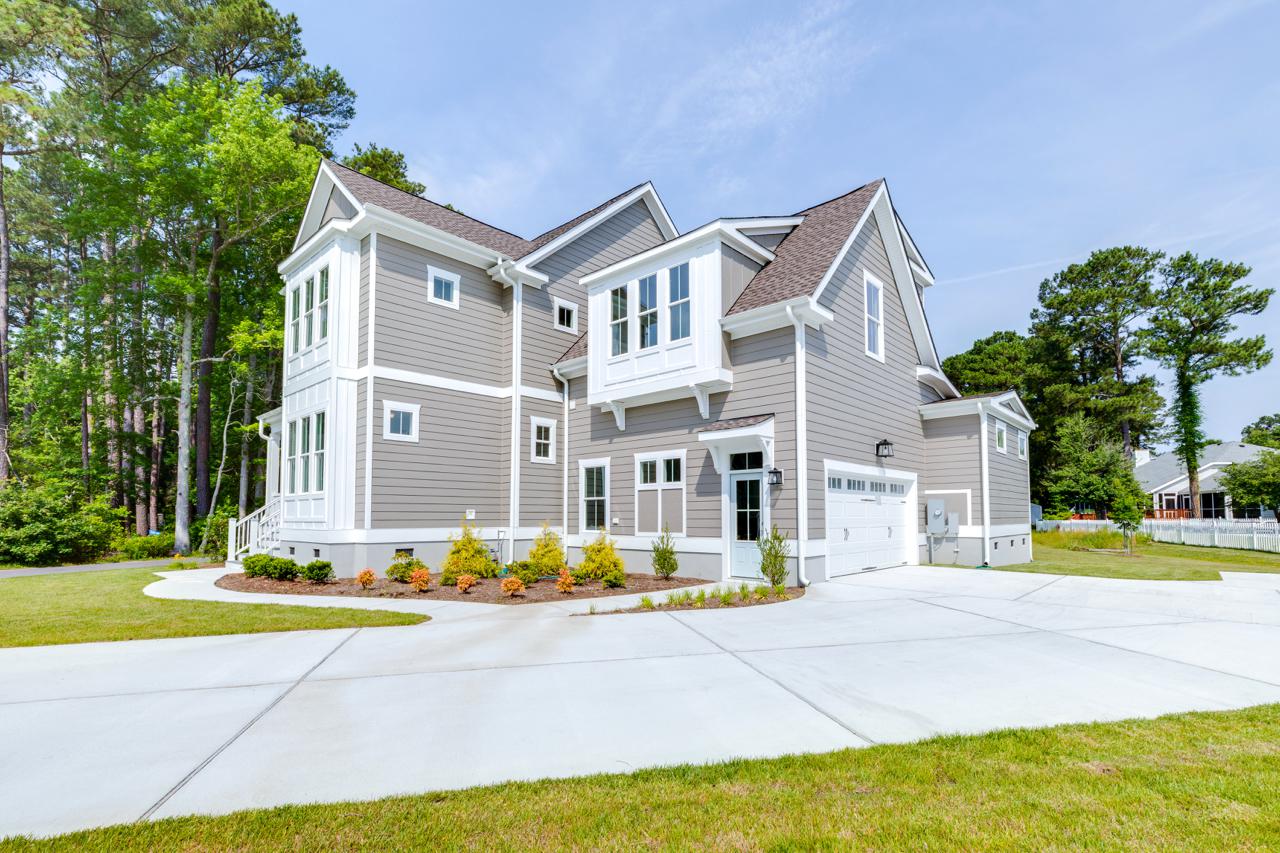 Elegant rear exterior of gray home showing garage  | Exterior Gallery | Stephen Alexander Homes | Chesapeake, VA