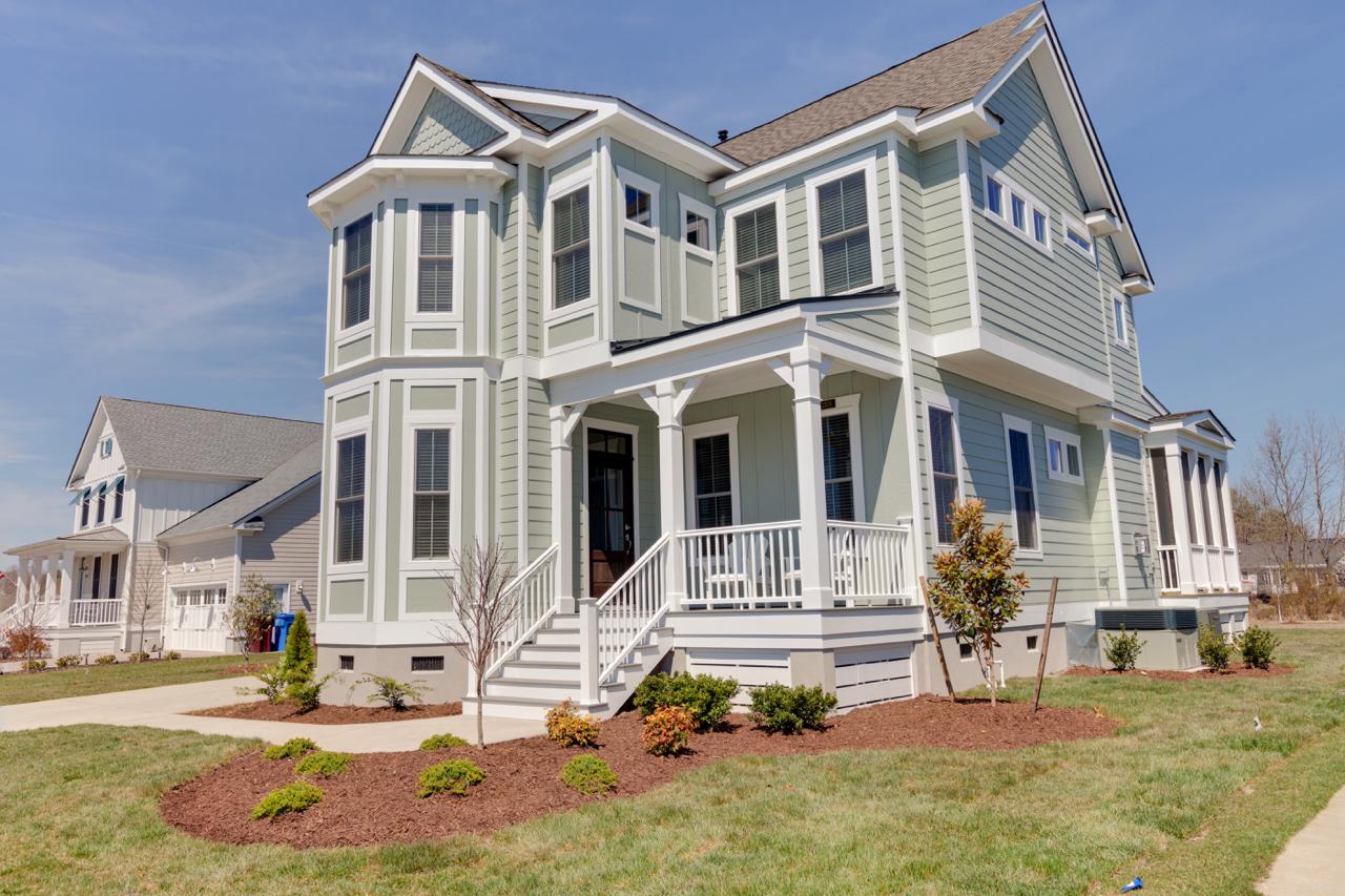 Elegant front exterior of light green home  | Exterior Gallery | Stephen Alexander Homes | Chesapeake, VA