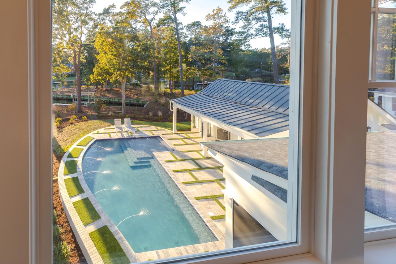 Elegant view of home exterior with pool  | Exterior Gallery | Stephen Alexander Homes | Chesapeake, VA