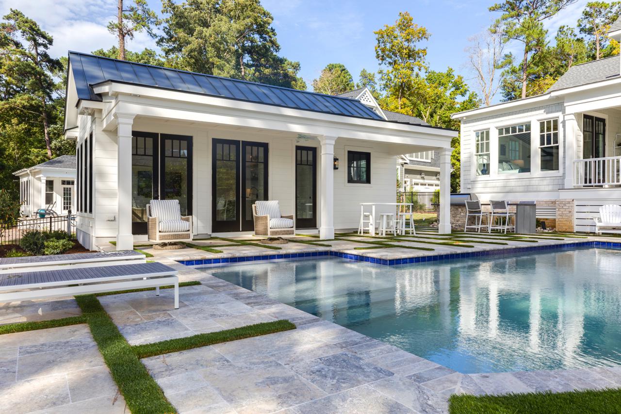 Elegant home rear exterior with view of pool and guest house | Exterior Gallery | Stephen Alexander Homes | Chesapeake, VA