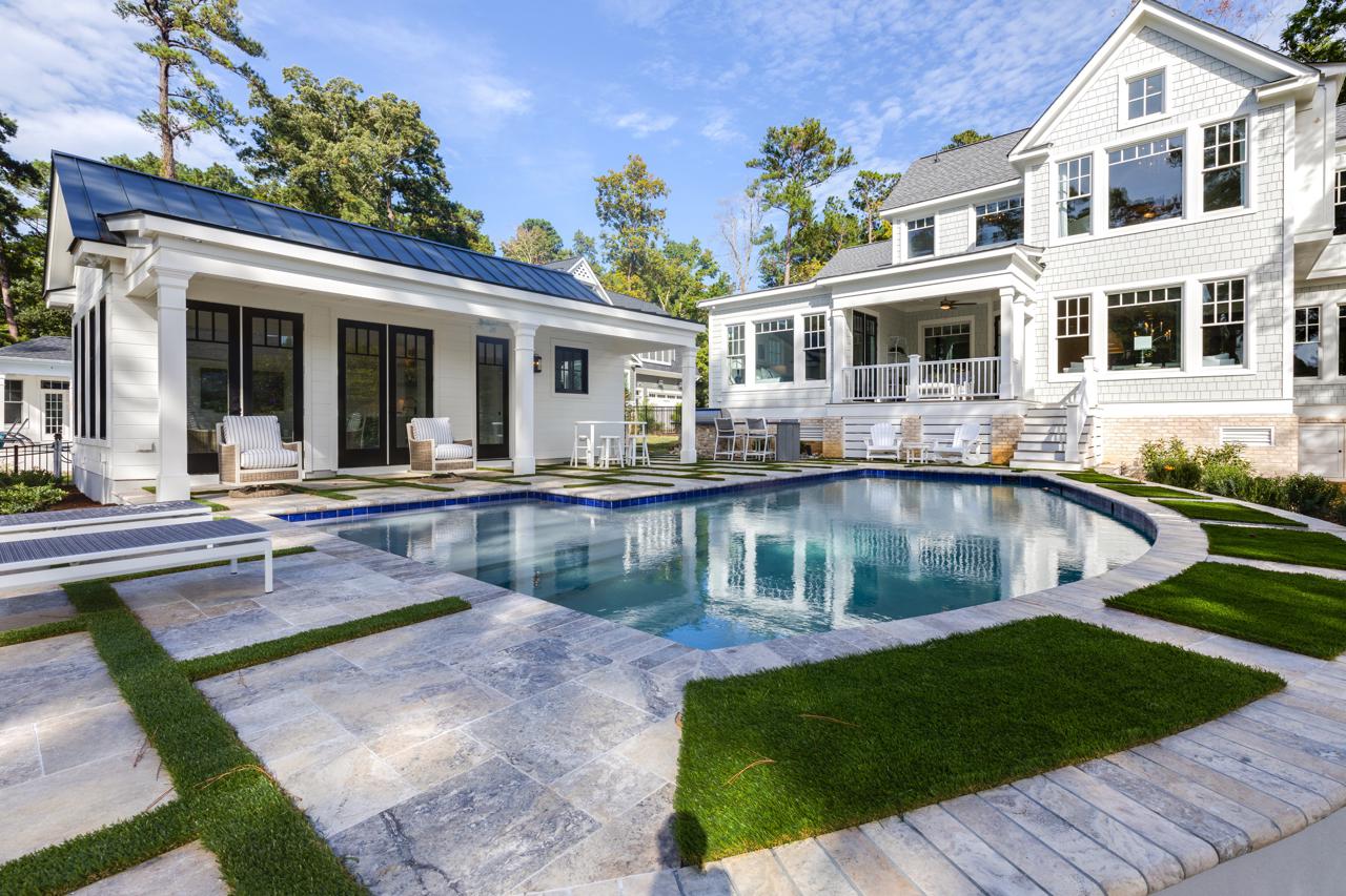 Elegant home rear exterior with view of pool and guest house | Exterior Gallery | Stephen Alexander Homes | Chesapeake, VA