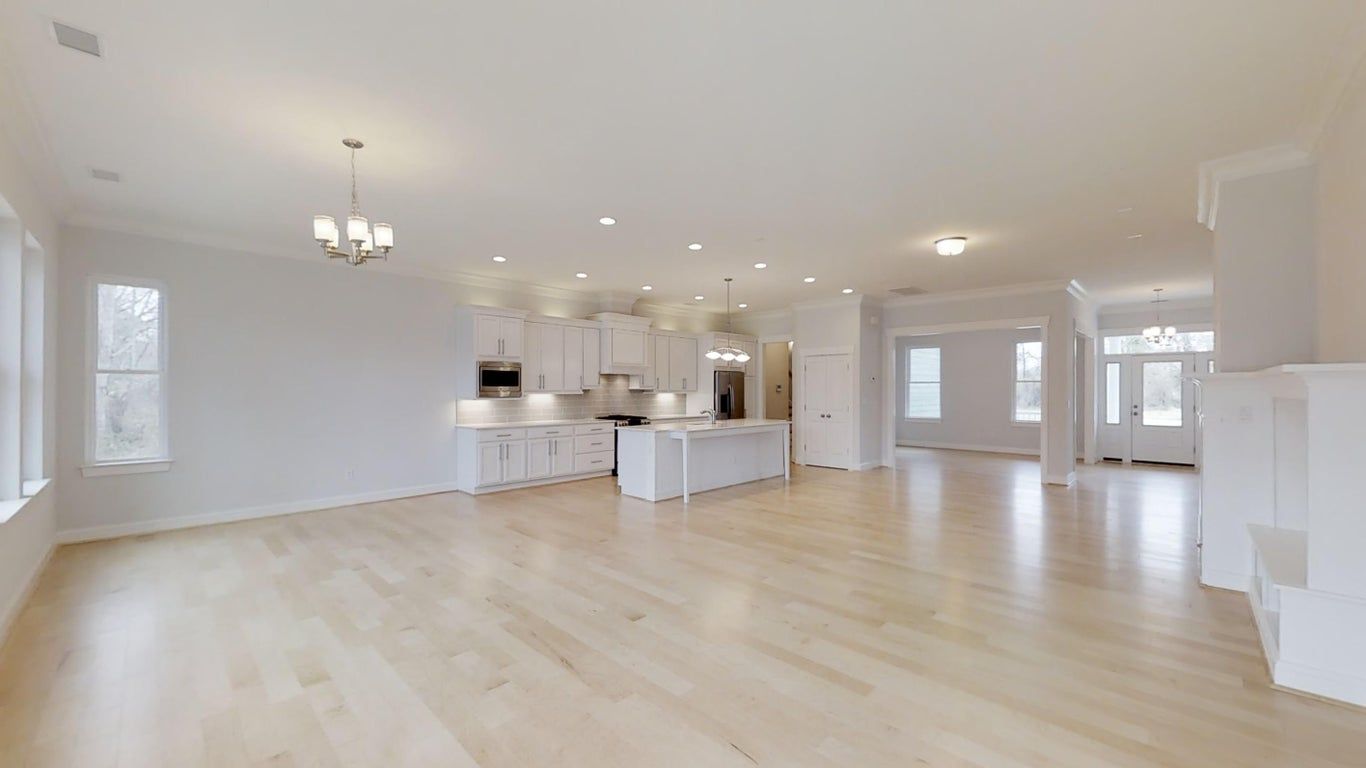 Elegant living area with view of kitchen | Bayou Cottage | 3D Tours | Stephen Alexander Homes | Chesapeake, VA