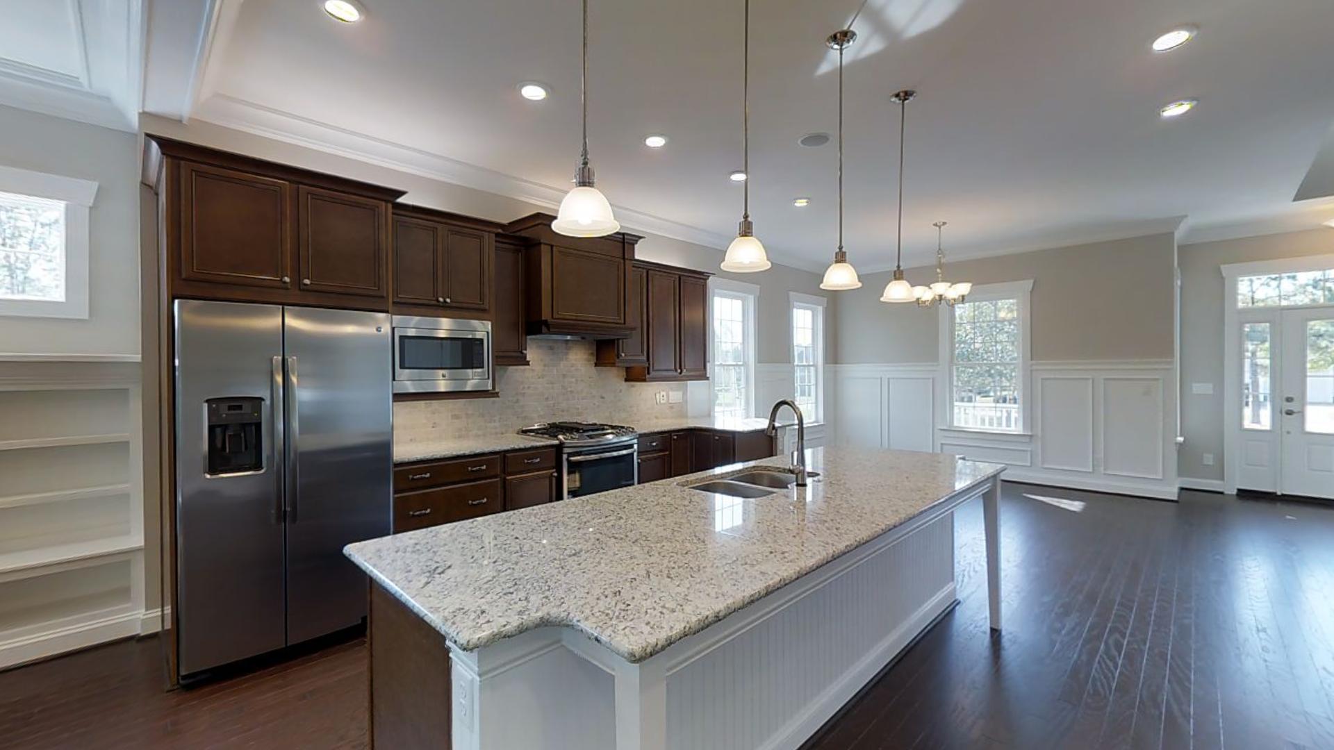 Elegant kitchen with island | St. Andrews Cottage | 3D Tours | Stephen Alexander Homes | Chesapeake, VA