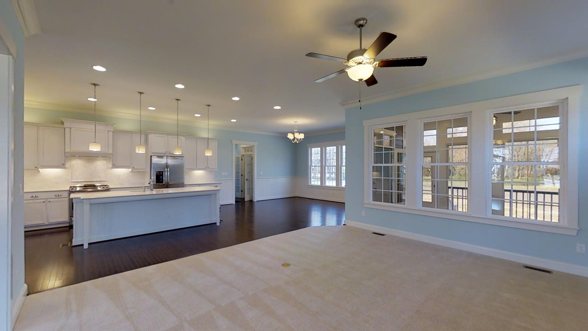 Elegant living area with view of kitchen | Custom Waverly | 3D Tours | Stephen Alexander Homes | Chesapeake, VA