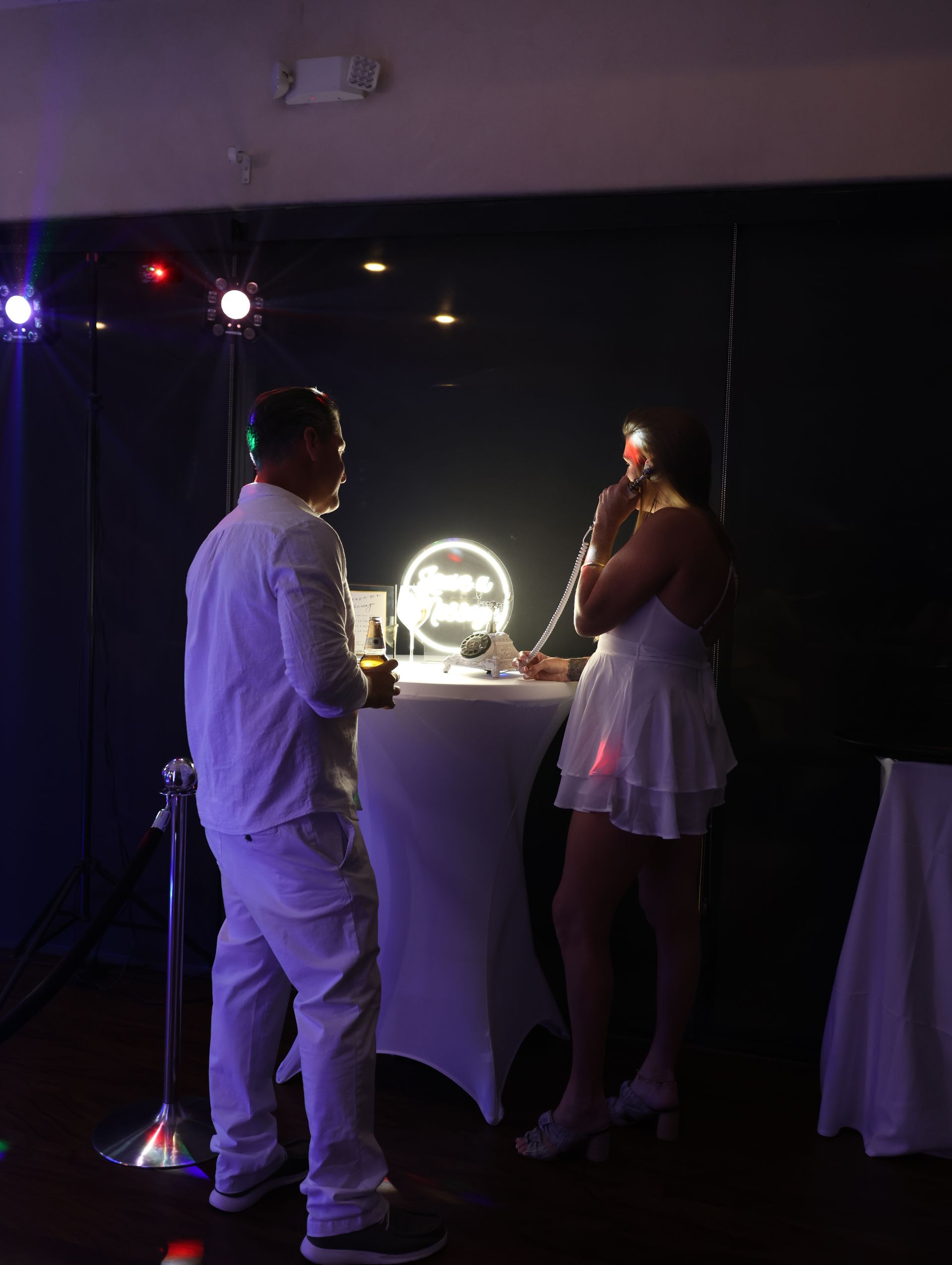 Couple using audio guestbook with IS Photobooth