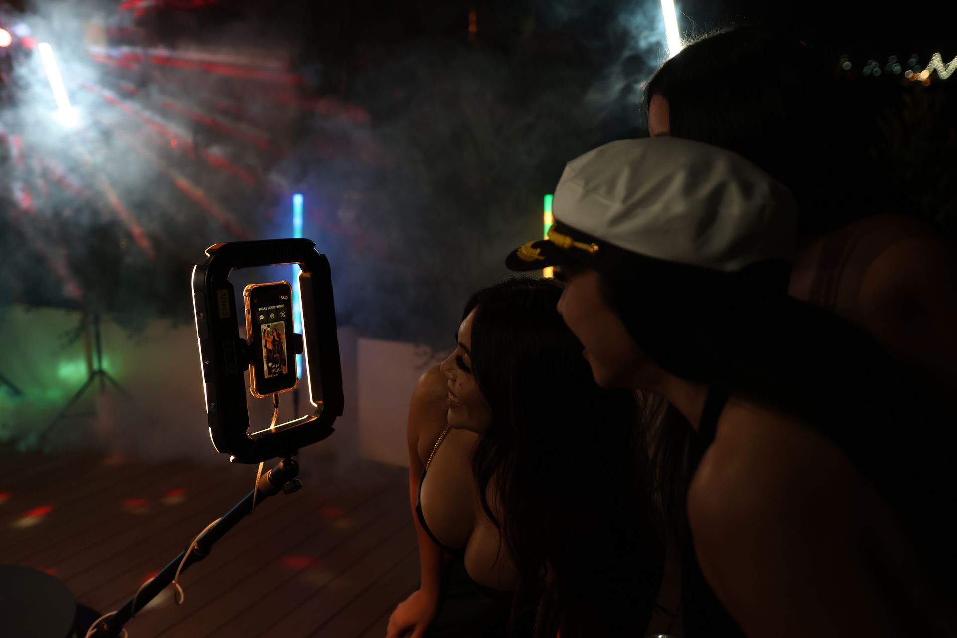 Two young girls at event with IS 360 Booth from IS Photobooth