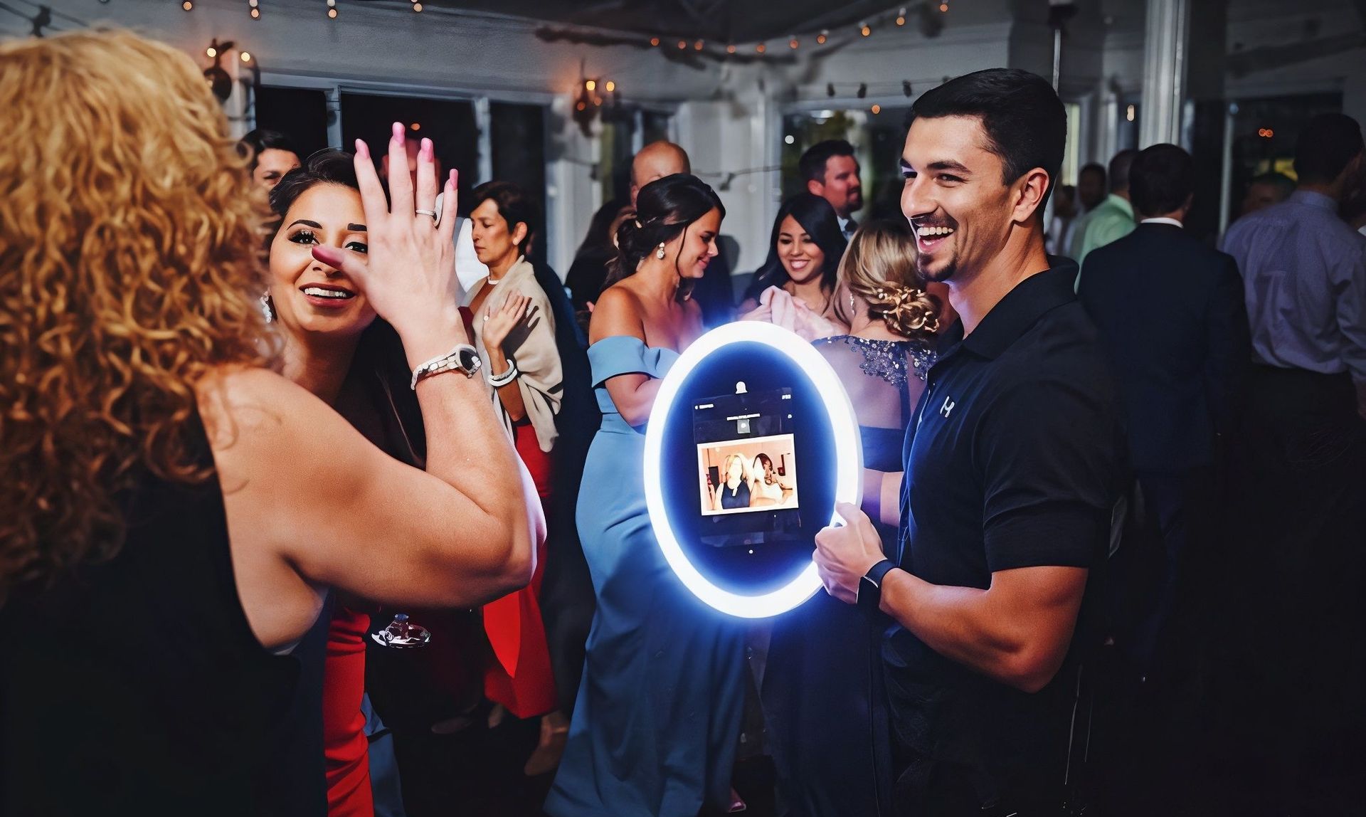 Guy holding the IS Roaming Booth