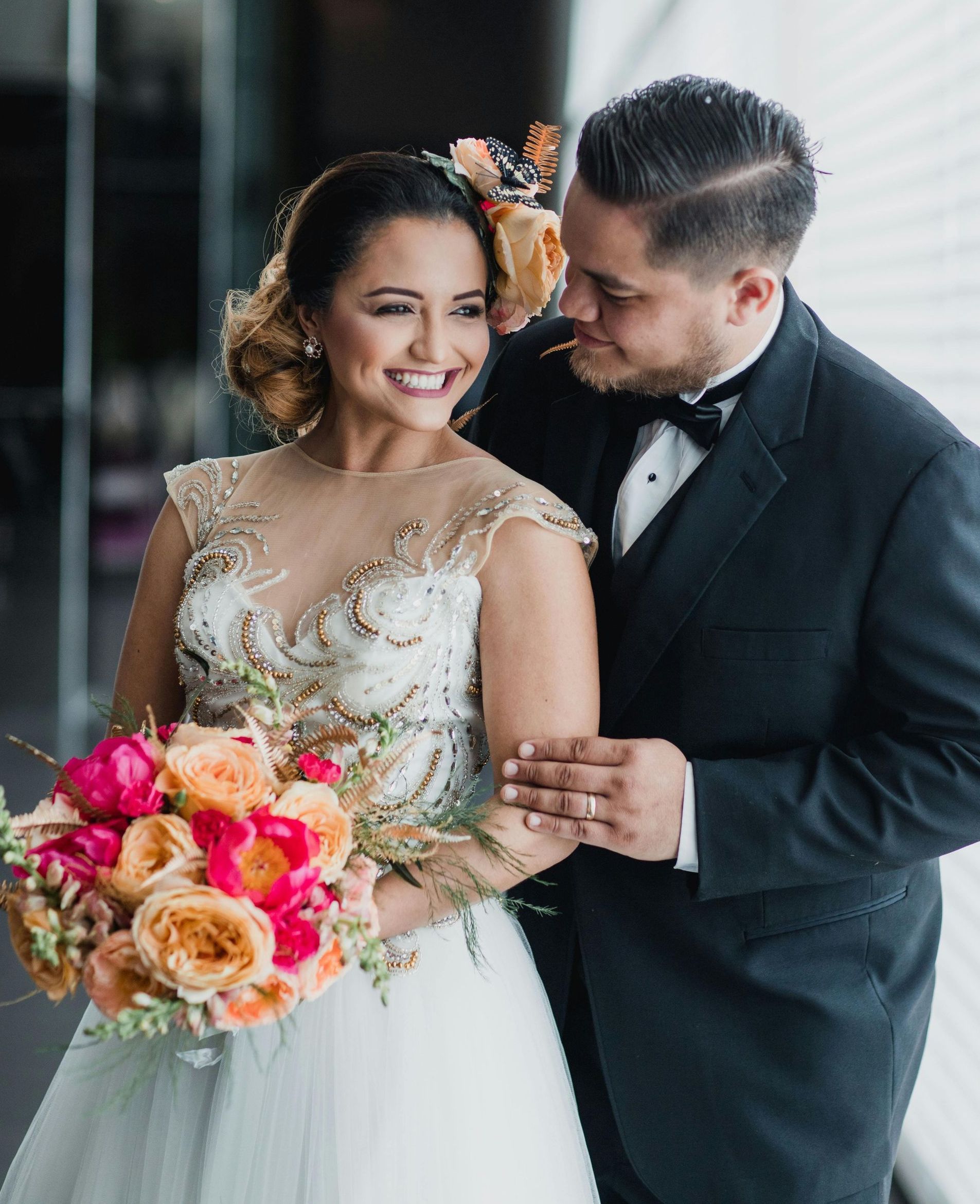 IS Photobooth wedding couple with husband looking at his bride to his right.