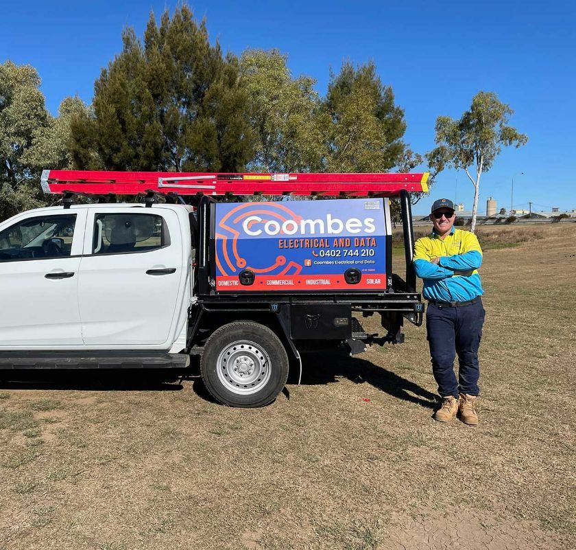 Ben Coombes Standing Beside His Service Vehicle — Electrical Services in Tamworth, NSW