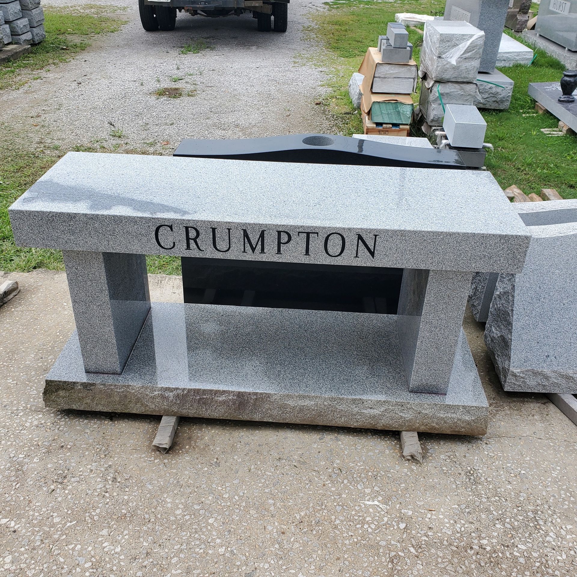 Gray granite bench engraved with