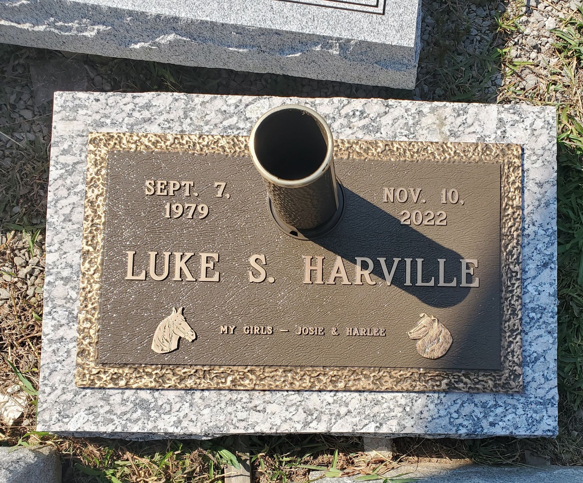 Bronze grave marker with dates Sept. 7, 1979 - Nov. 10, 2023. Name: Luke S. Harville, on a granite base.
