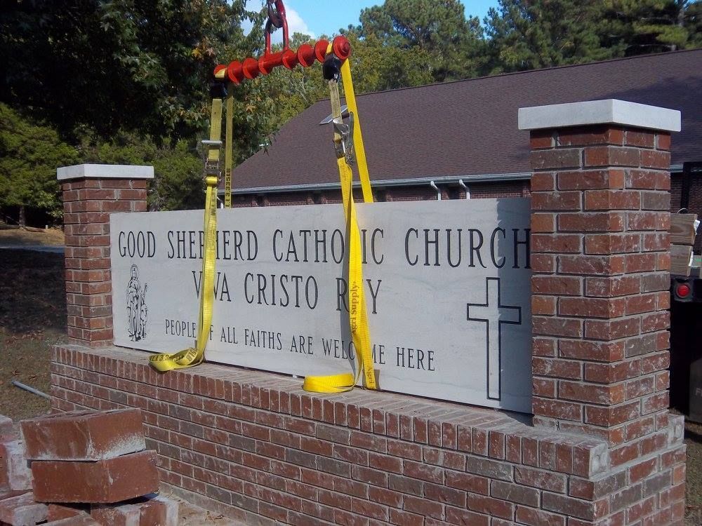 Black tombstone with a drum set, photo, and inscription for Jerry Wayne Bradford, 1955-2013.