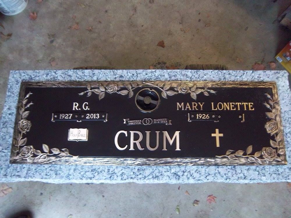 Bronze grave marker with names