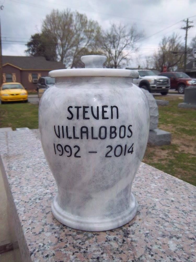 Marble urn with lid, engraved