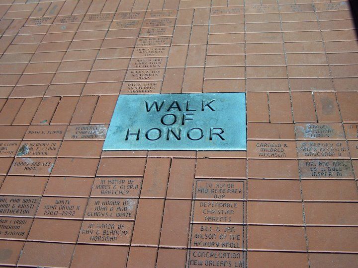 Black tombstone with a drum set, photo, and inscription for Jerry Wayne Bradford, 1955-2013.
