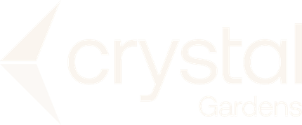 Faded Crystal Gardens logo with abstract leaf icon and pale gray text