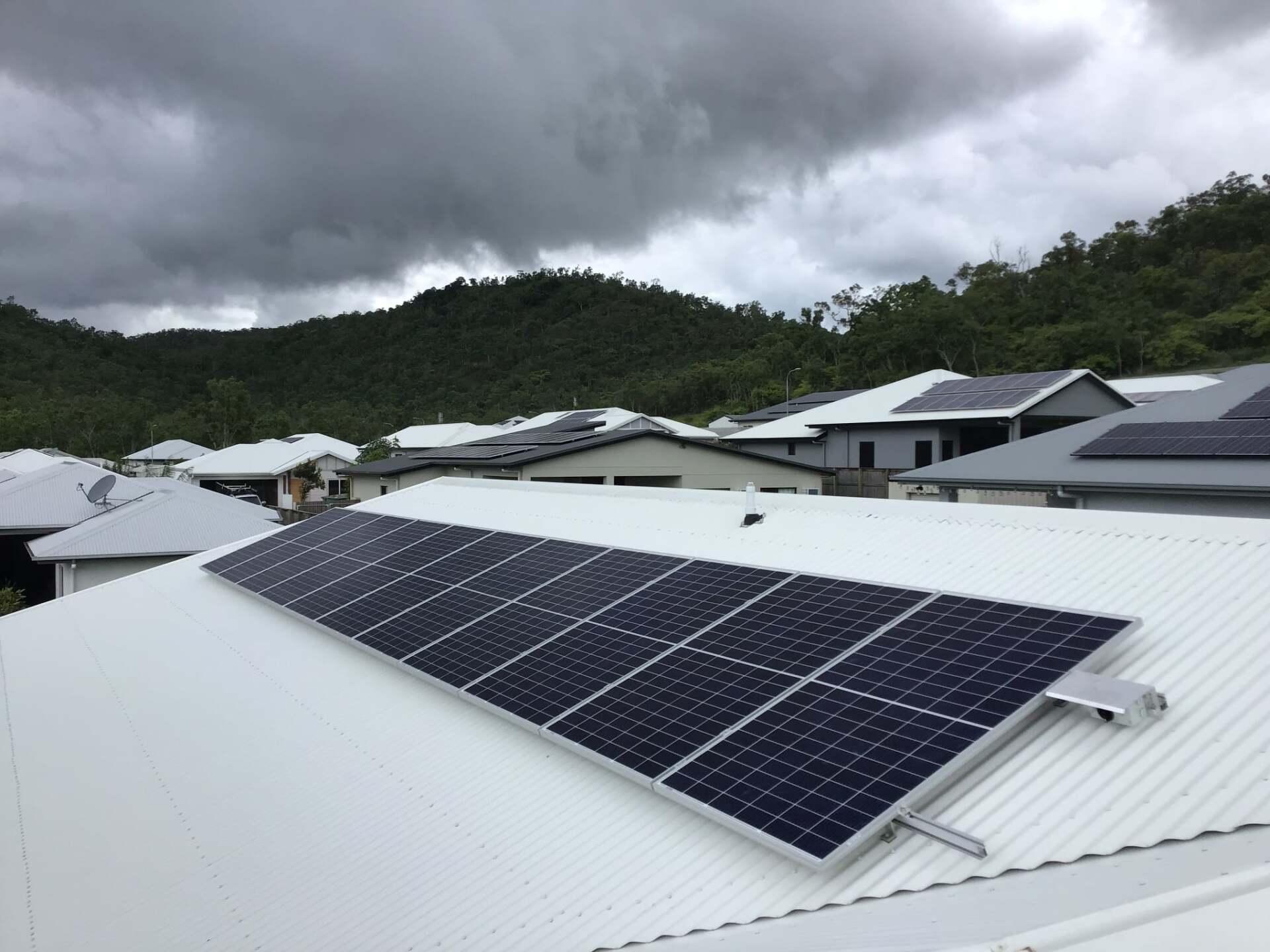 solar panel installation on white residential roof - Central Solar Services Townsville