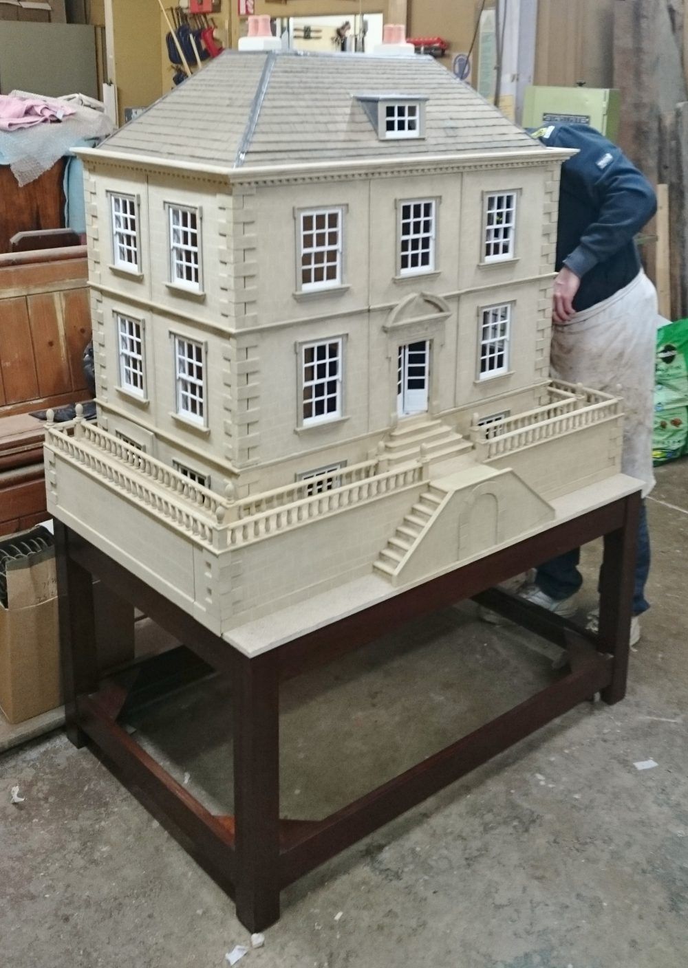 A model of a house is sitting on a table