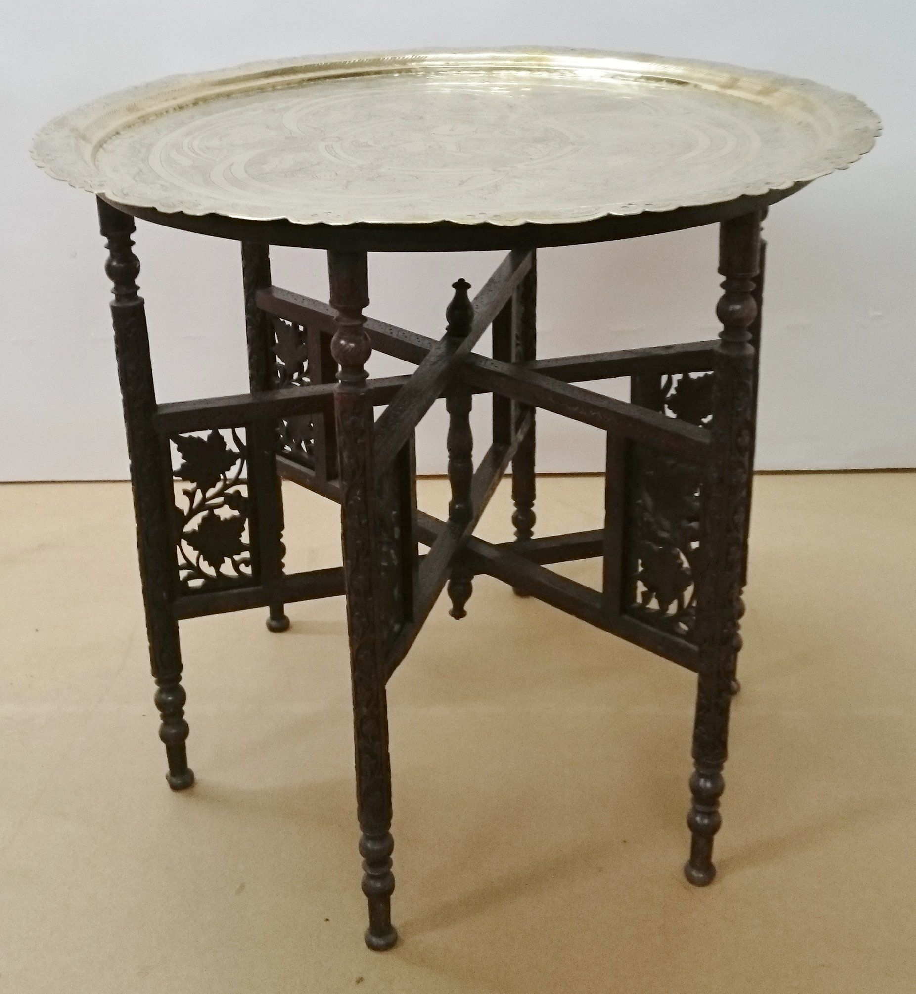 A small table with a tray on top of it