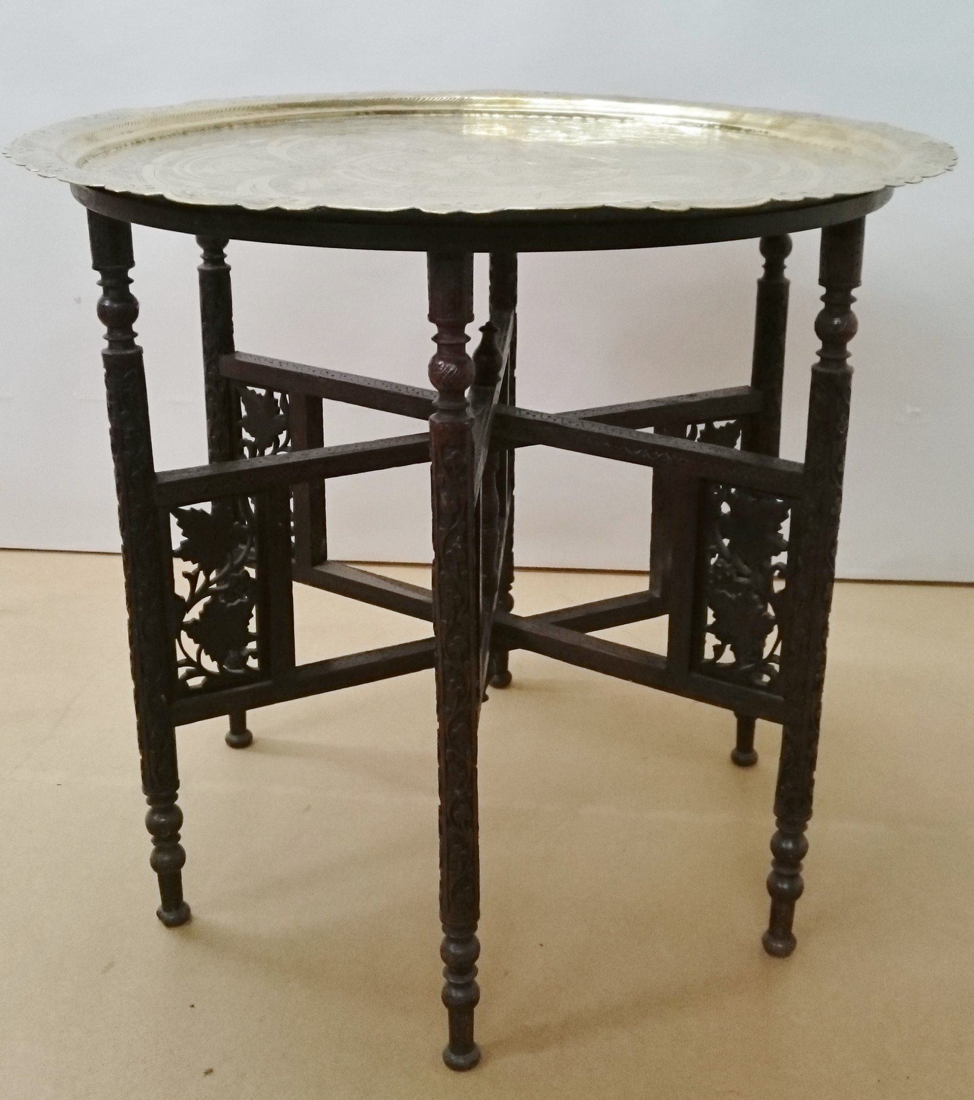 A small table with a tray on top of it