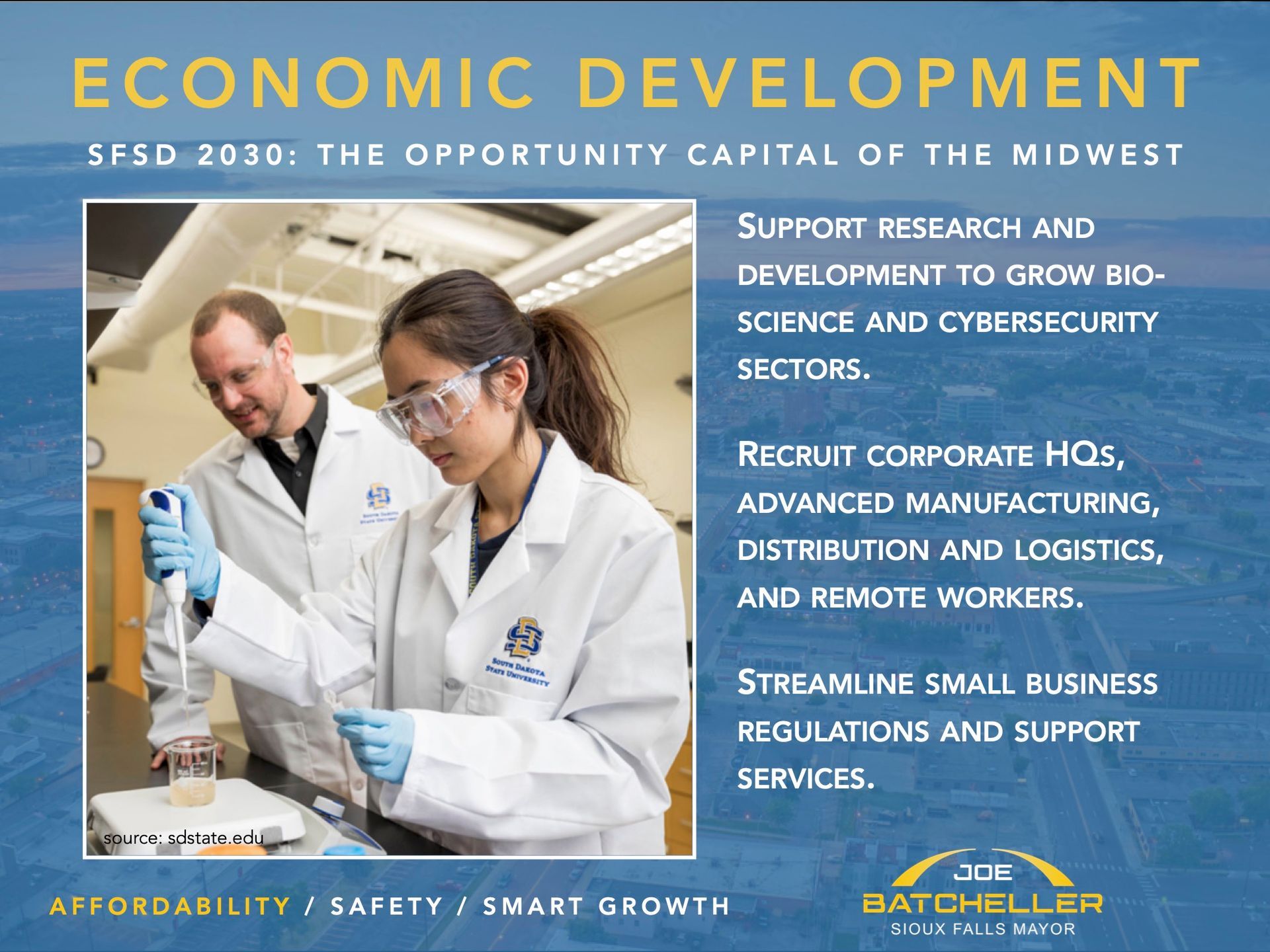 Doctors in lab coats reviewing paperwork with economic development text on blue background