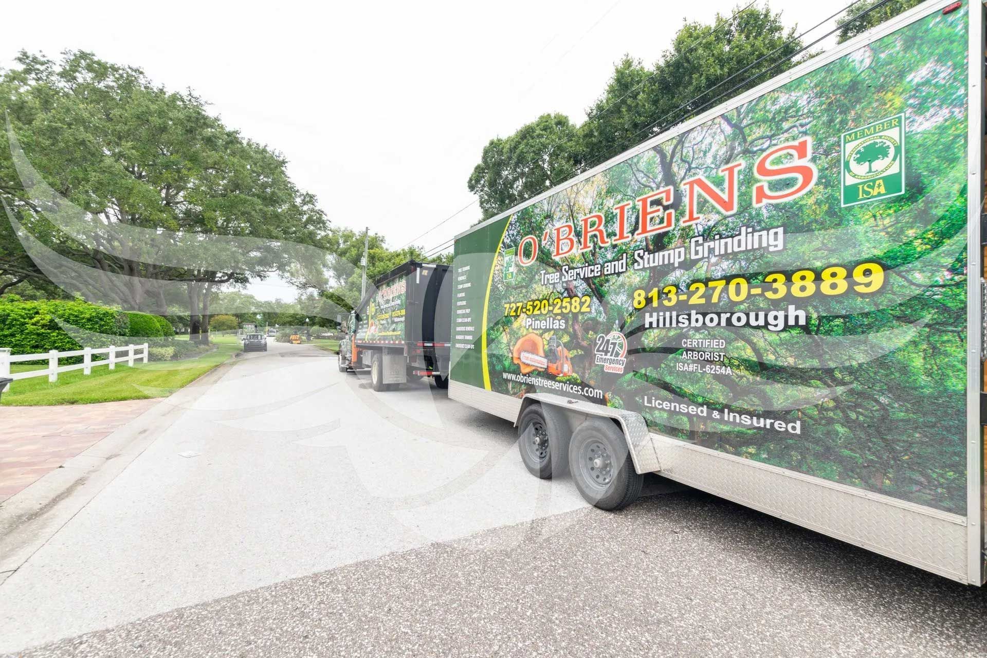 A trailer is parked on the side of the road.