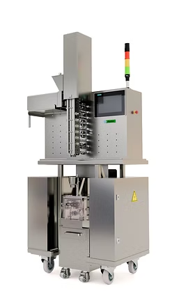 Stainless steel automated packaging machine with touchscreen, signal tower, and product hopper.