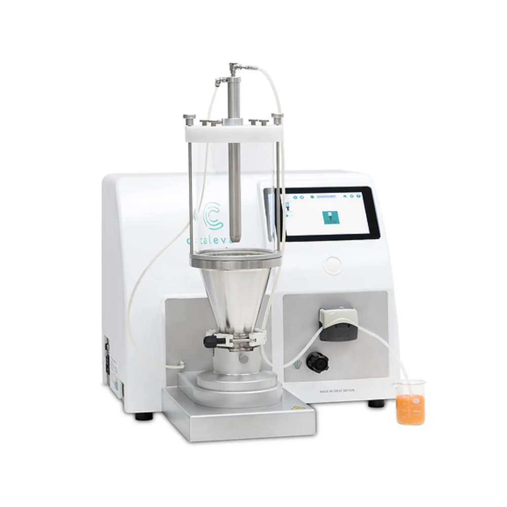 Automated pill packaging machine filling blister packs with red capsules.