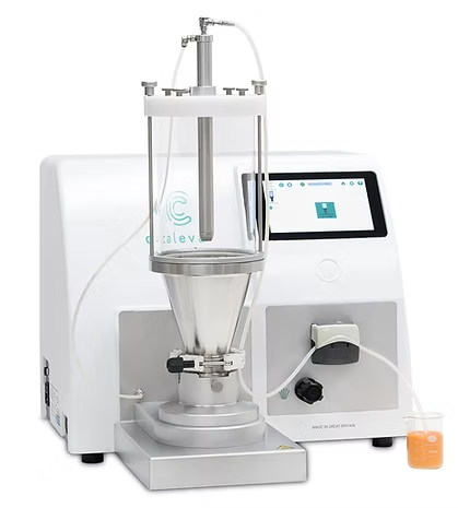 White lab equipment with a glass cylinder, a touchscreen, and liquid in a beaker.