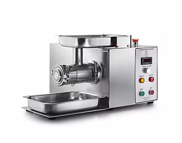 Stainless steel oil press machine with digital controls, a tray, and a feeding hopper.