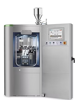 A silver automated pharmaceutical manufacturing machine with an open door and touchscreen.