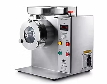 Stainless steel industrial food grinder with control panel and hopper.