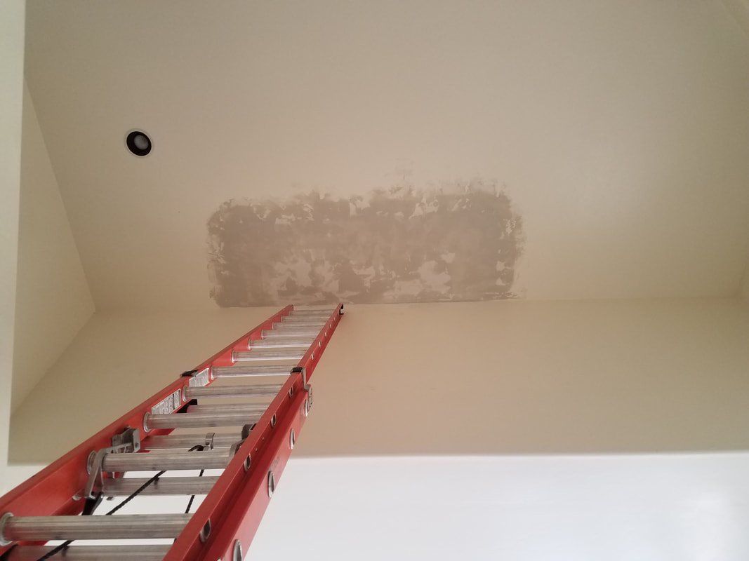 Sheetrock repair on a 21' high ceiling