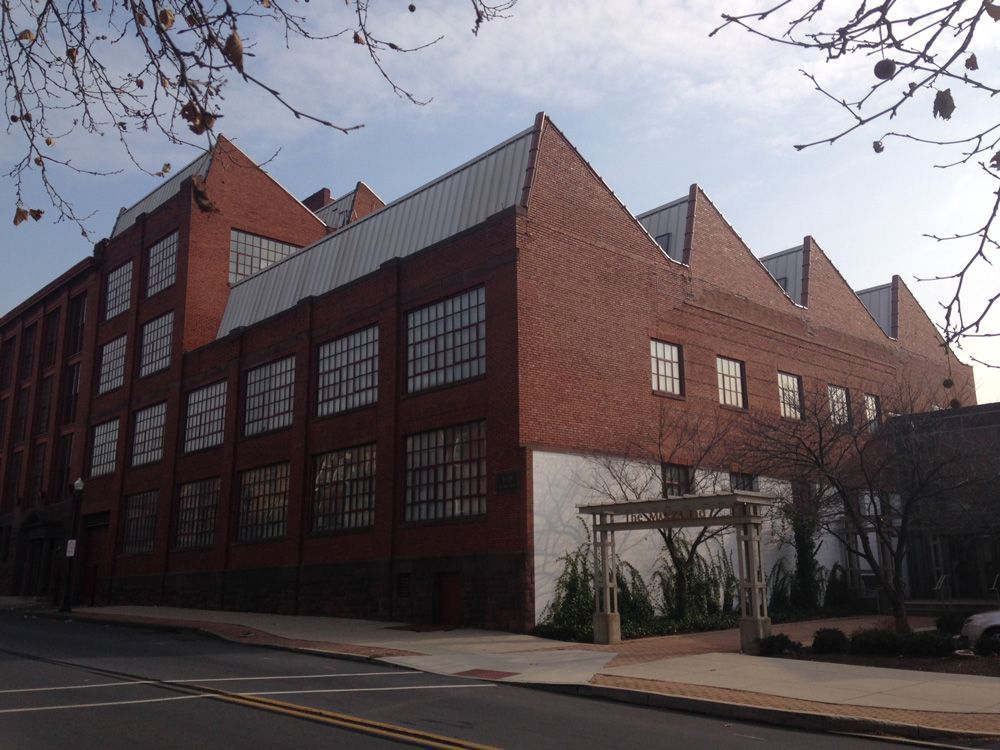 A large brick building with a lot of windows