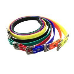 A stack of several coiled, brightly colored plastic dog collars with metal buckles and D-rings.