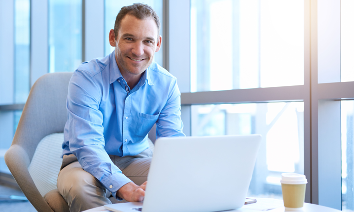 Man sitting in front of laptop