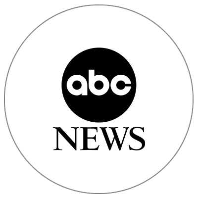 A black and white logo for abc news in a circle.