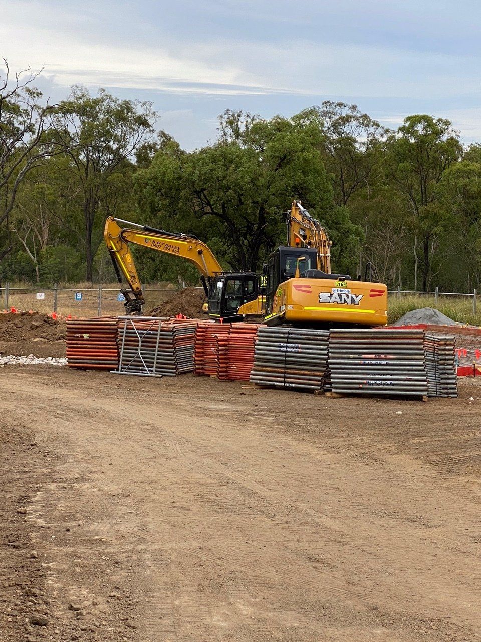 Mini Bobcat Working On A Street Reconstruction — K & T Daley in Central Highlands, QLD