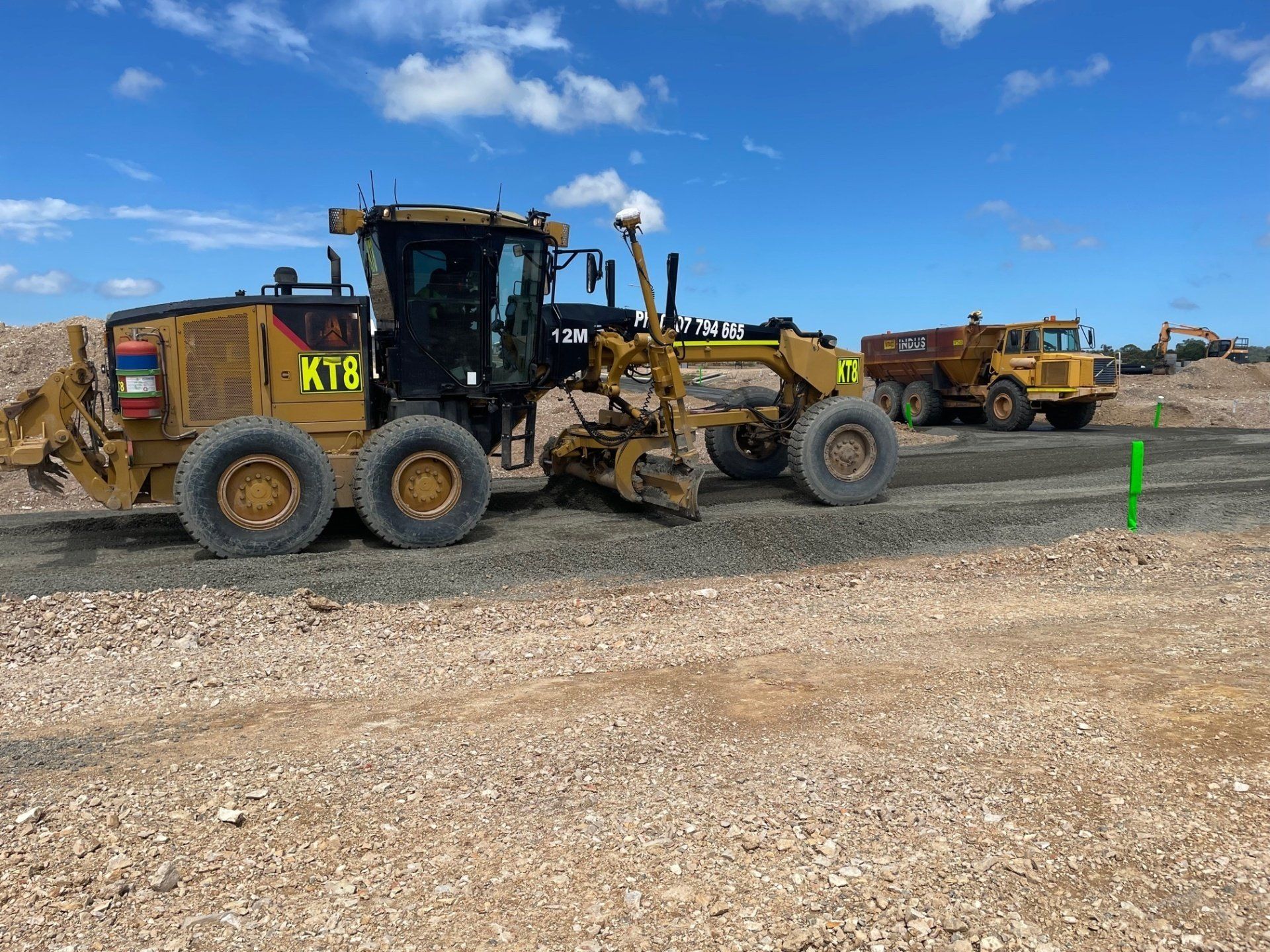 Excavator Loader On A Sunny Day — K & T Daley in Central Highlands, QLD
