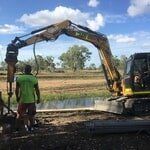 Yellow Excavator — K & T Daley in Gracemere, QLD