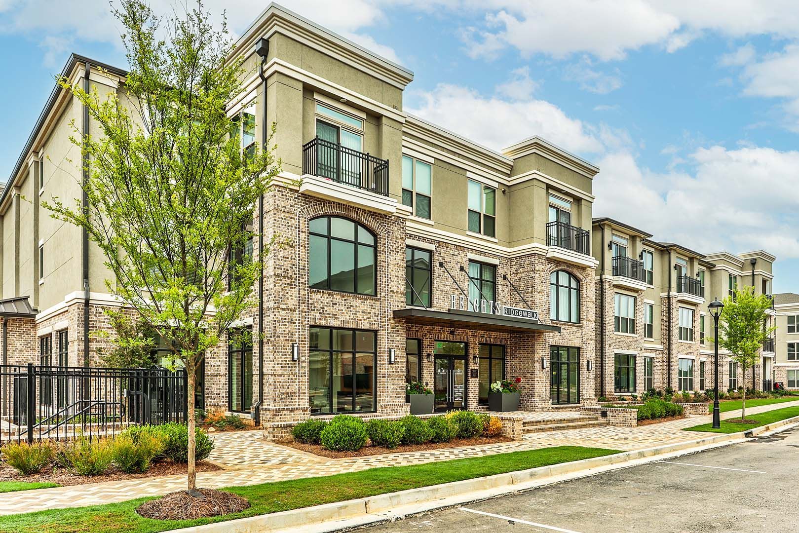 Apartment building exterior view at The Heights at Ridgewalk at Woodstock, GA.