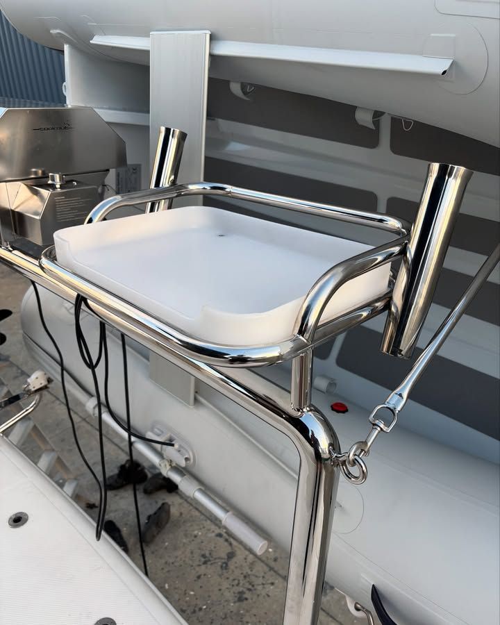 Stainless Steel Boat-mounted Cutting Board and Rod Holders — Master Metals Fabrication in Labrador, QLD