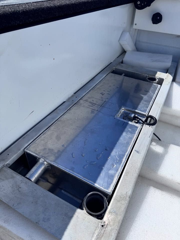 A Rectangular Metal Fuel Tank Installed Within a Boat's Hull — Master Metals Fabrication in Labrador, QLD