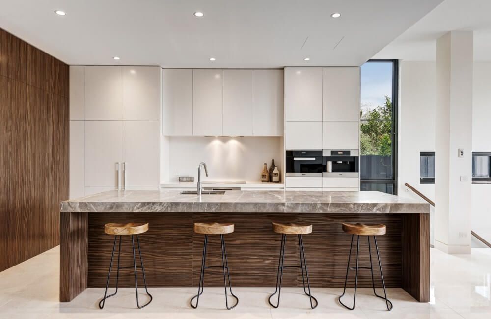 Kitchen Featuring Bar Stools For A Stylish Dining Experience — Experienced Builder in Bowen, QLD