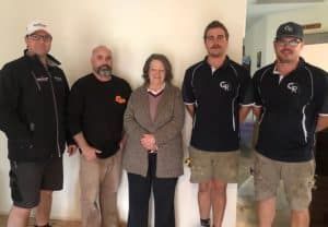 Five People Standing in Front of a White Wall — My Timber Flooring Blinds & Shutters in Erina, NSW