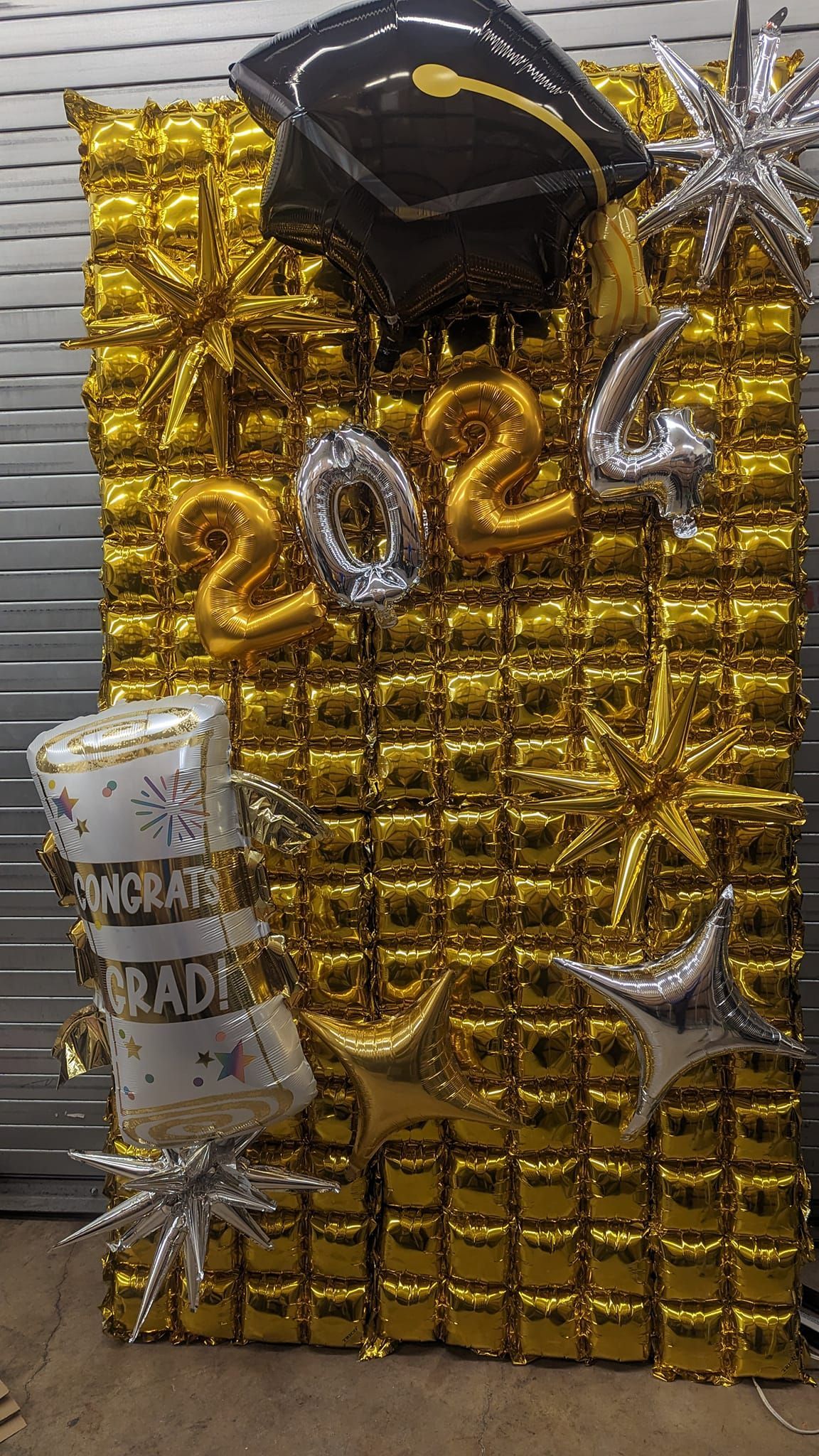 Gold balloon backdrop with